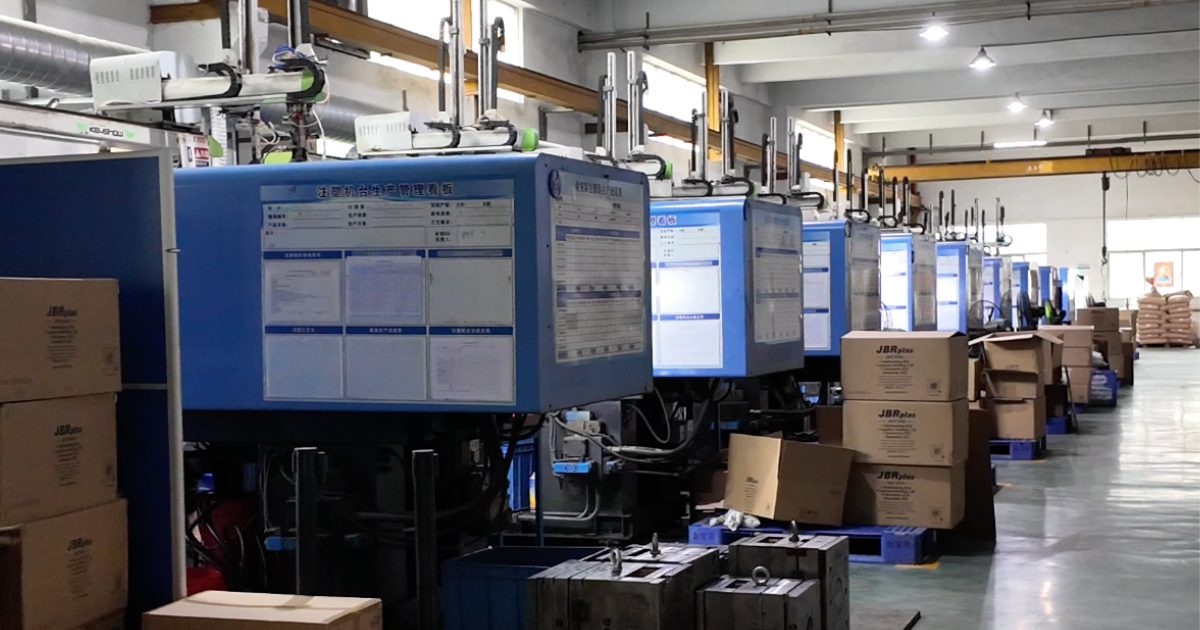 Injection molding workshop line No.1 at JBRplas Shenzhen — servo-hydraulic presses with automated part removal and real-time process monitoring