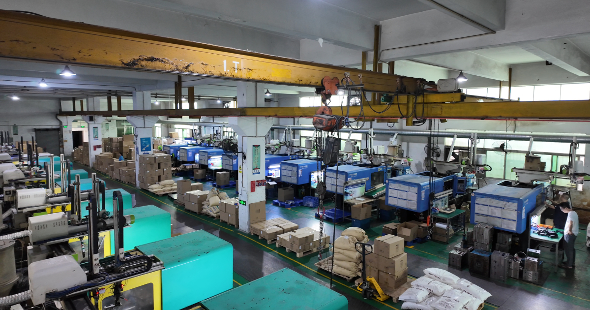 JBRplas injection molding production floor with rows of servo-hydraulic presses — Shenzhen plastic injection molding factory